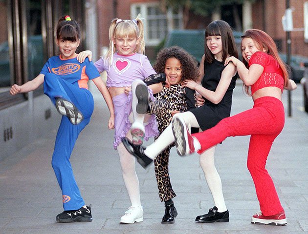 Top London store Harrods launch their new collection of children's wear styled on the Spice Girls today (Friday). Spice Gear, aimed at 4-14 year-old girls, is modelled by mini Spice Girls (l to r) Sporty Spice, Miriam Ziriat (aged 9); Baby Spice, Abigail Fullerton (8); Scary Spice, Tanesia Price (5); Posh Spice, Lucy Potter (7); and Ginger Spice, Rebecca Young (8). Photo by Ben Curtis/PA